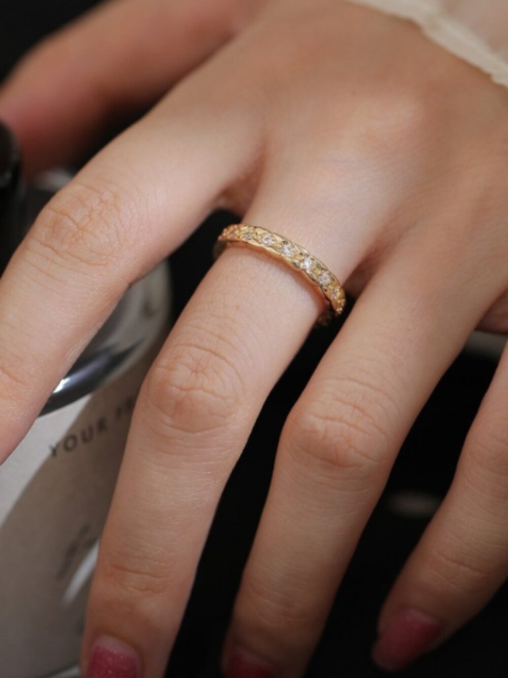 Golden small gemstone ring